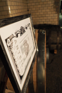 Ruhrpott Whisky - Bild eines Anteilscheins aus für den Whisky "Schlägel & Eisen" auf den Fässern aus deutscher Eiche in denen der Whisky lagert. Das perfekte Geschenk!
